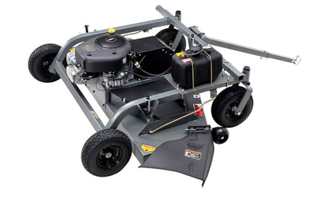 60 inch side discharge cutting deck on Swisher tow behind mower