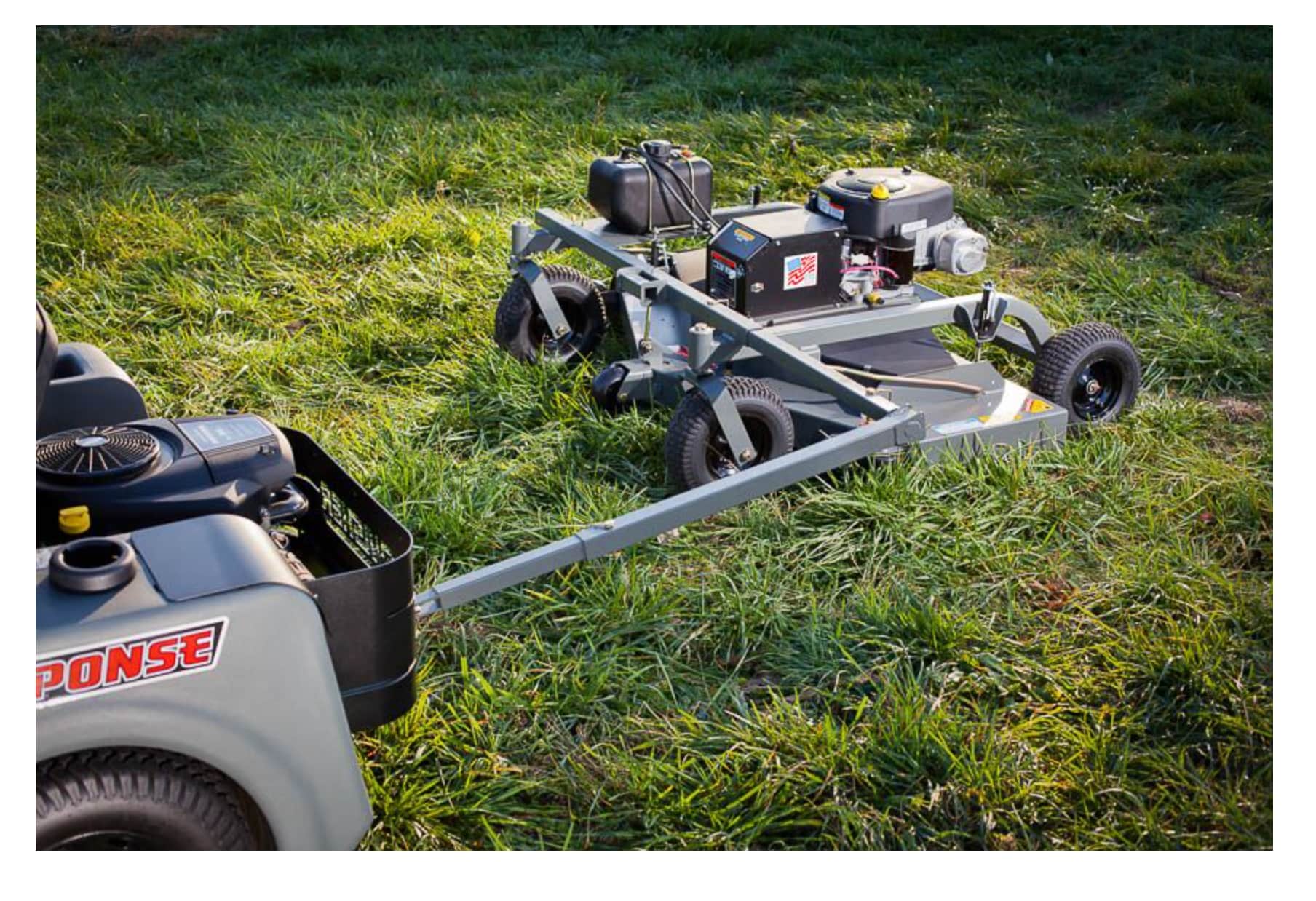 Swisher FC15560BS tow behind mower attached to ATV